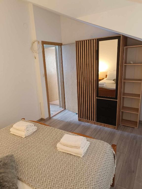 Postel nebo postele na pokoji v ubytování Antonia Apartments