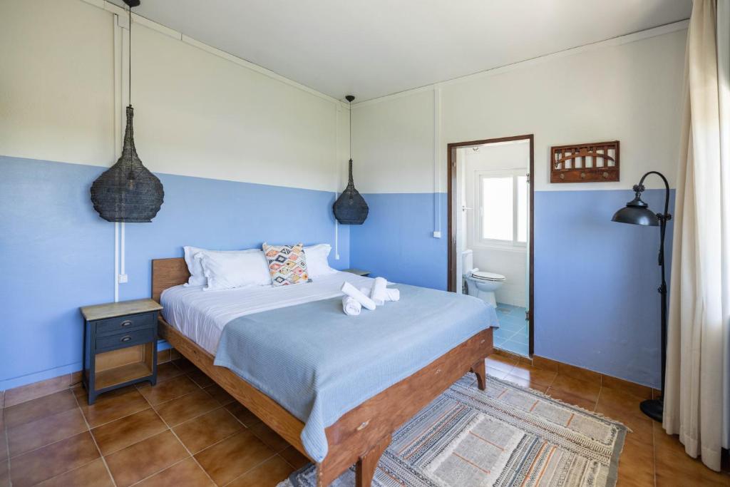 Postel nebo postele na pokoji v ubytování MUTE Hostel Milfontes