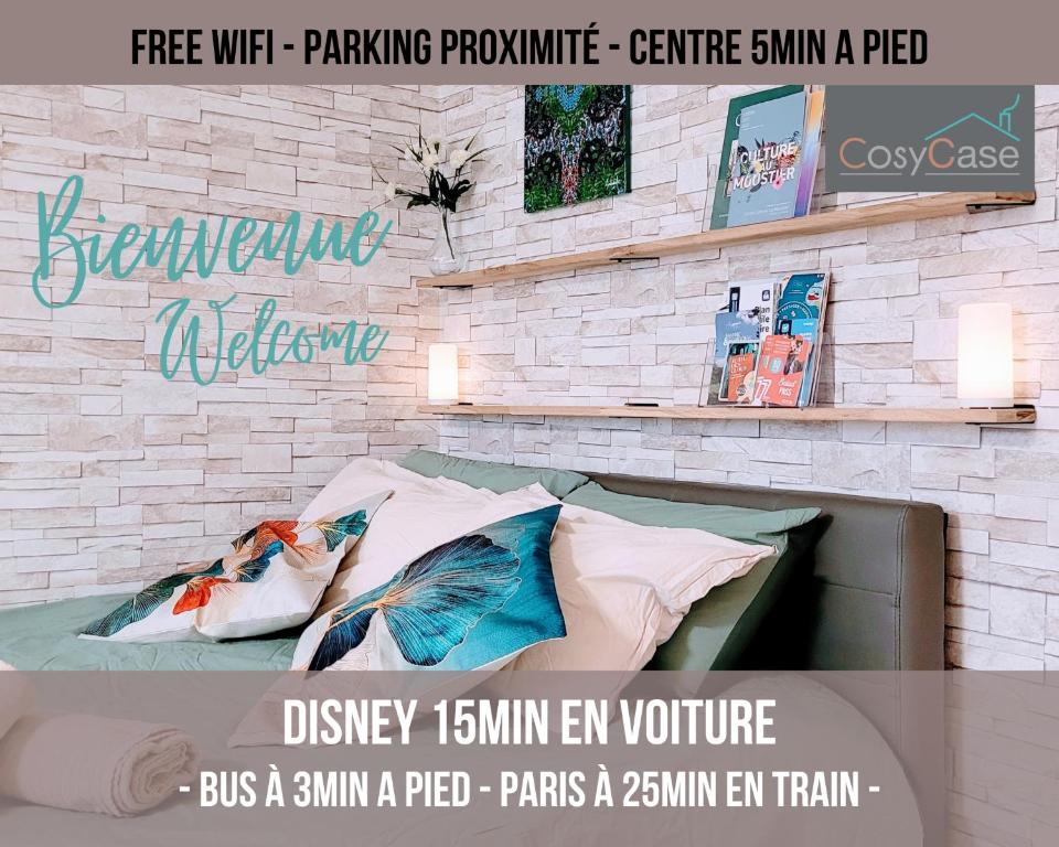 um cartaz para uma loja com uma cama com almofadas em Cosy Case proche Disney and Paris em Lagny