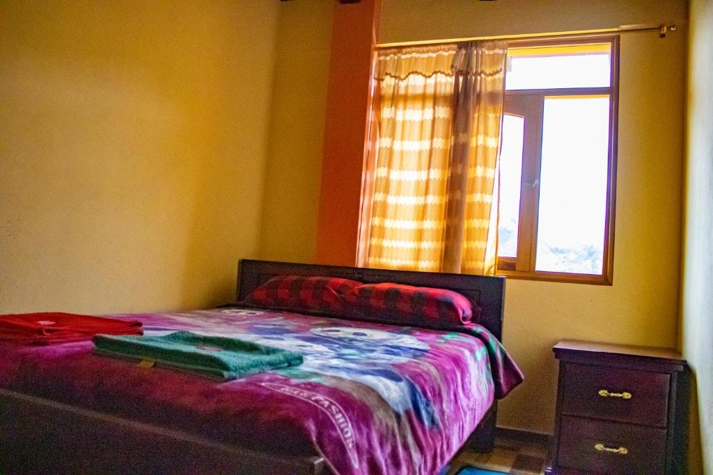Postel nebo postele na pokoji v ubytování Hostal El Inca