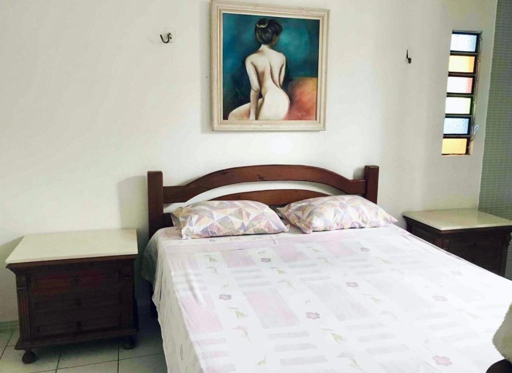 Ένα ή περισσότερα κρεβάτια σε δωμάτιο στο Casa Pròximo Da Beira Mar