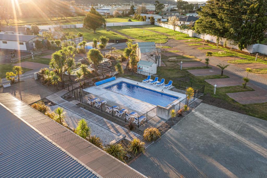 an overhead view of a swimming pool in a park at Tasman Holiday Parks - Rotorua in Rotorua