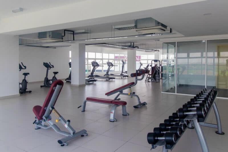 Fitness centrum a/nebo fitness zařízení v ubytování NaiBnB in Impiria Residensi