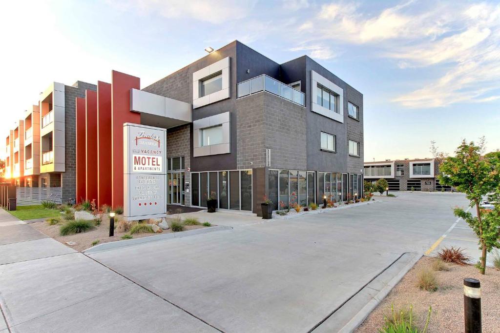 a large building with a sign in front of it at Bridges on Argyle in Traralgon