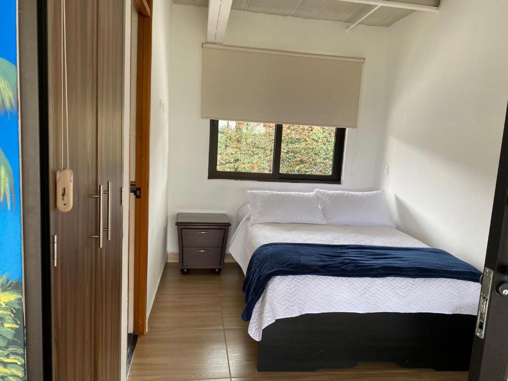 Postel nebo postele na pokoji v ubytování Finca Hotel 12 Palmas- Aeropuerto JMC