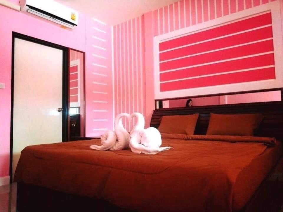 Postel nebo postele na pokoji v ubytování Navy Resort