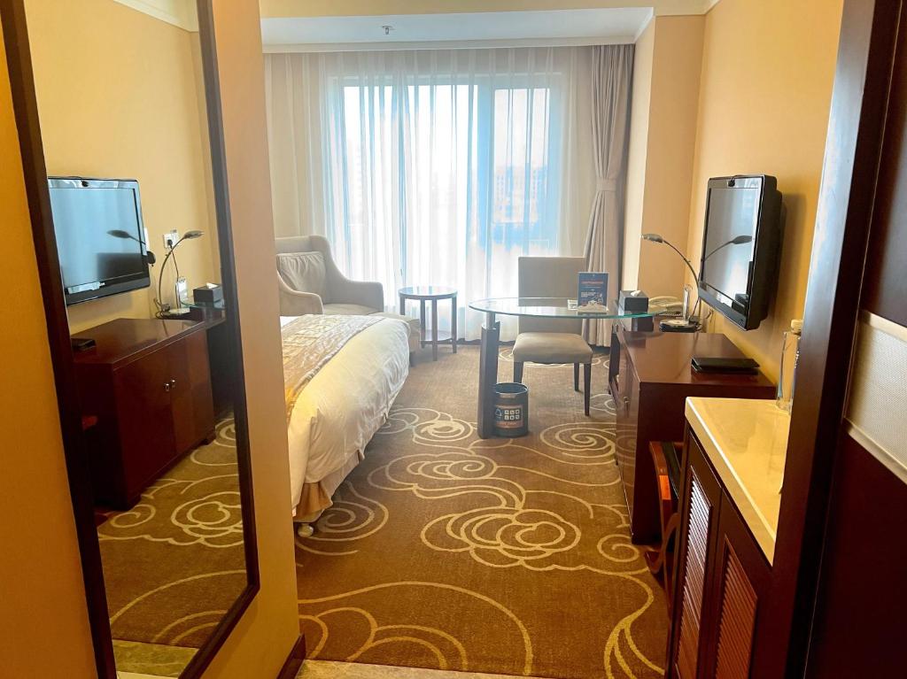 TV a/nebo společenská místnost v ubytování Inner Mongolia Grand Hotel