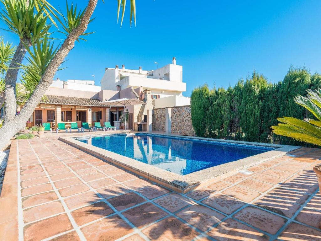 a swimming pool in front of a villa at Buenos Aires - Villa With Private Pool In Manacor Free Wifi in Manacor