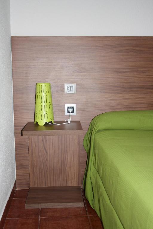 Postel nebo postele na pokoji v ubytování Hostal La Estación