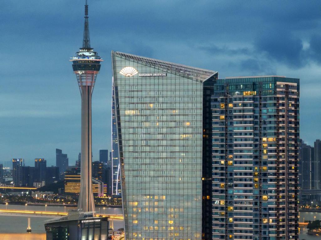 a view of a city with the space needle at Mandarin Oriental, Macau in Macau