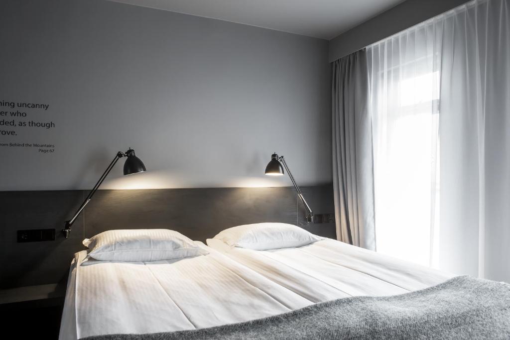 Skuggi Hotel by Keahotelsにあるベッド