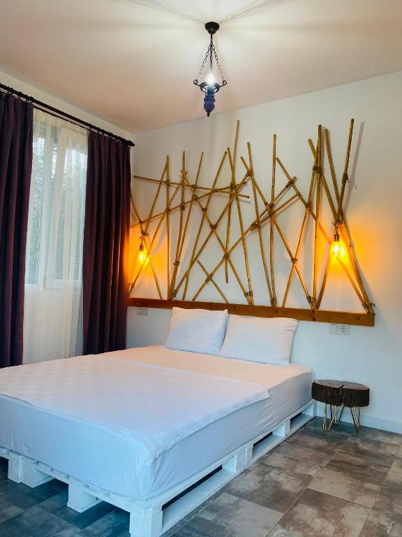a bedroom with a large bed in a room at Çıralı Marina Loft in Cıralı