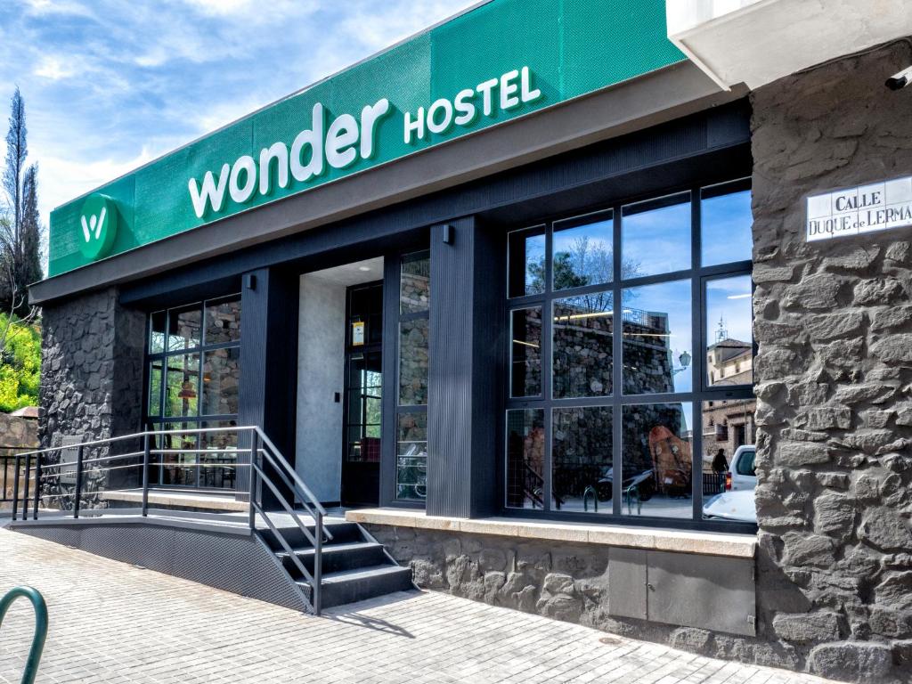 a building with a sign that reads wonder hostel at Wonder Hostel in Toledo