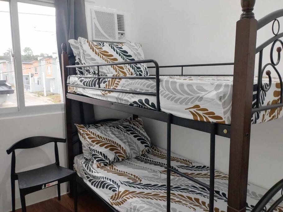 Postel nebo postele na pokoji v ubytování DC Urban - Transient home