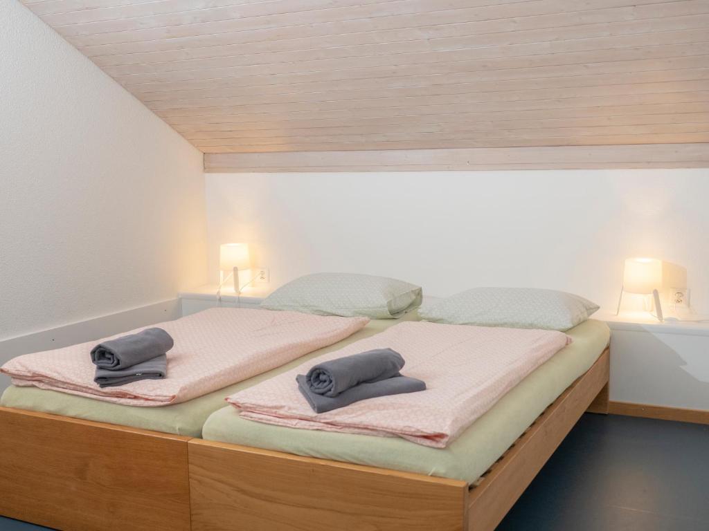 Postel nebo postele na pokoji v ubytování Zug Youth Hostel