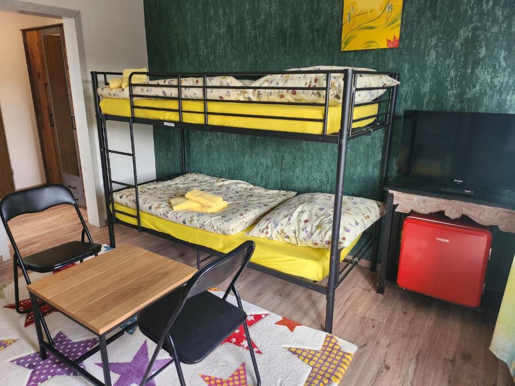 Postel nebo postele na pokoji v ubytování Gästehaus Senger