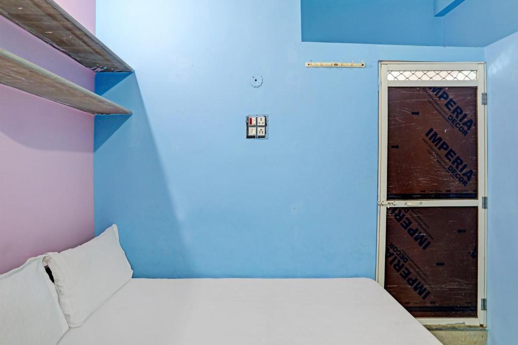 Cama o camas de una habitación en SPOT ON Hotel Sagar Royal