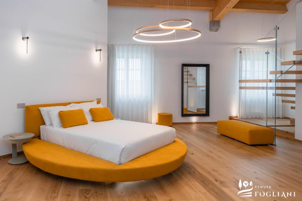 Postel nebo postele na pokoji v ubytování TENUTA FOGLIANI Resort & Natural Spa