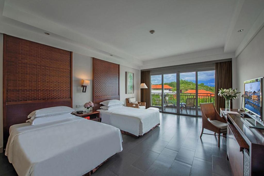 Postel nebo postele na pokoji v ubytování Sheraton Huizhou Beach Resort