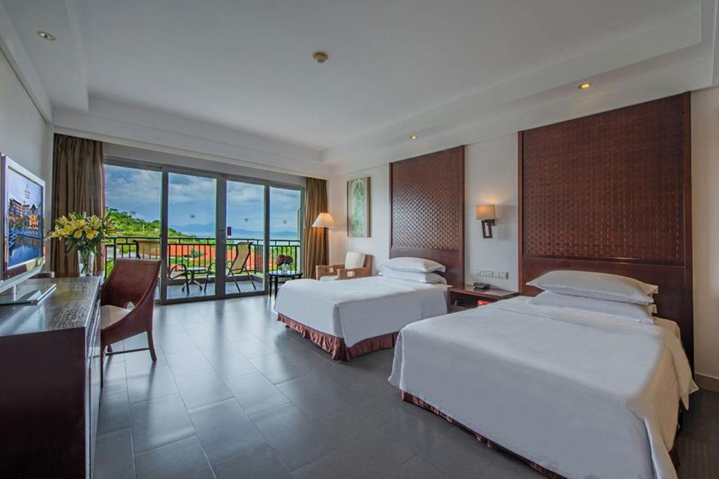 Postel nebo postele na pokoji v ubytování Sheraton Huizhou Beach Resort