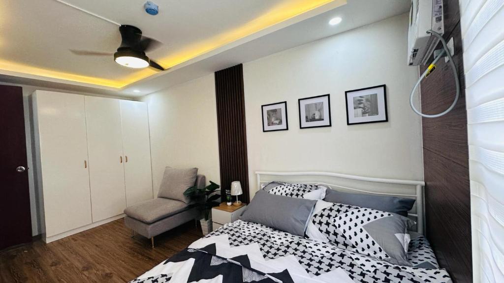 Llit o llits en una habitació de ECO Staycation - En Casa Orila