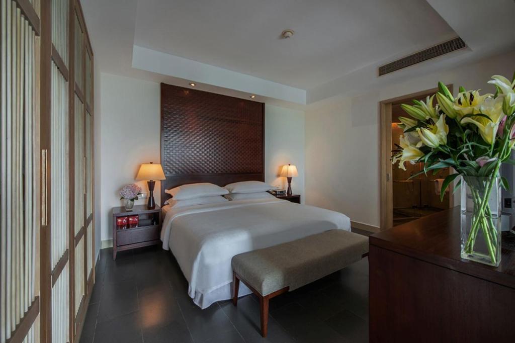 Postel nebo postele na pokoji v ubytování Sheraton Huizhou Beach Resort
