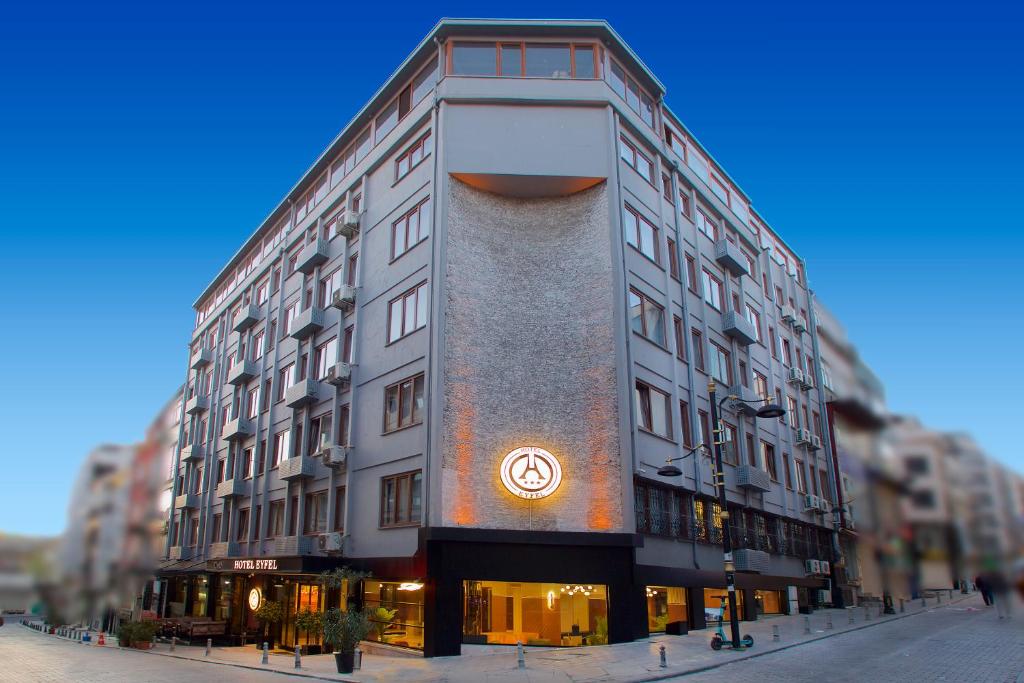 a building with a sign on the side of it at Hotel Eyfel in Istanbul