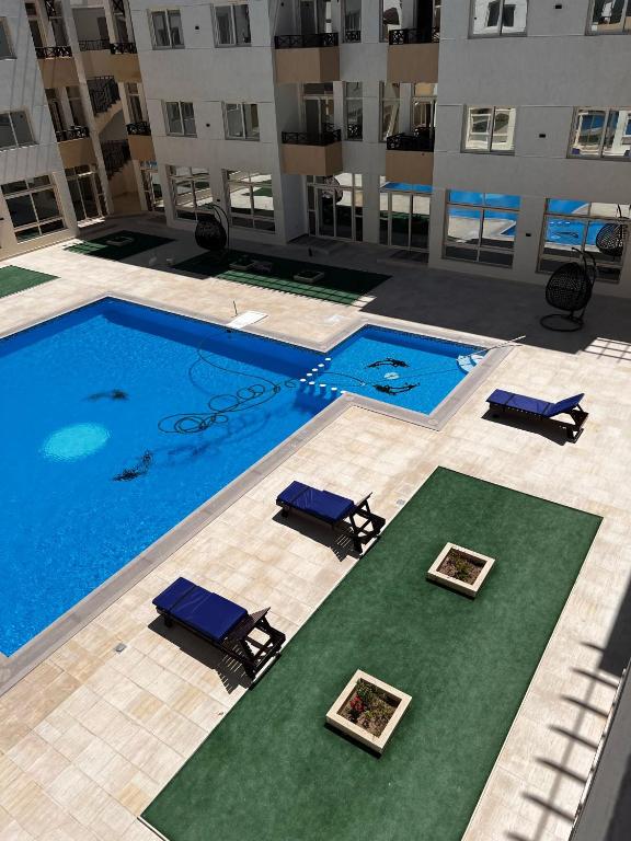 Bazén v ubytování Port Ghalib Apartments nebo v jeho okolí