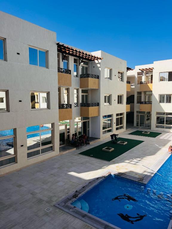 Bazén v ubytování Port Ghalib Apartments nebo v jeho okolí