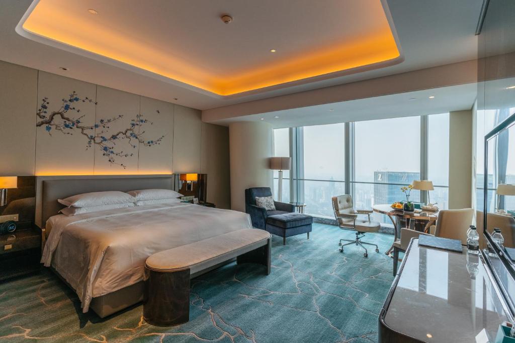 Postel nebo postele na pokoji v ubytování Na Lotus Hotel, a Luxury Collection Hotel, Nanning