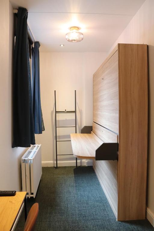 Postel nebo postele na pokoji v ubytování Milling Hotel Mini 11
