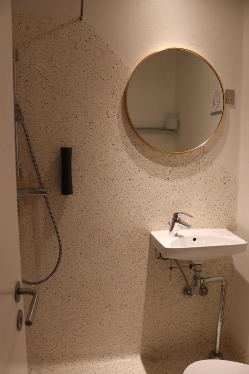 Koupelna v ubytování Milling Hotel Mini 11