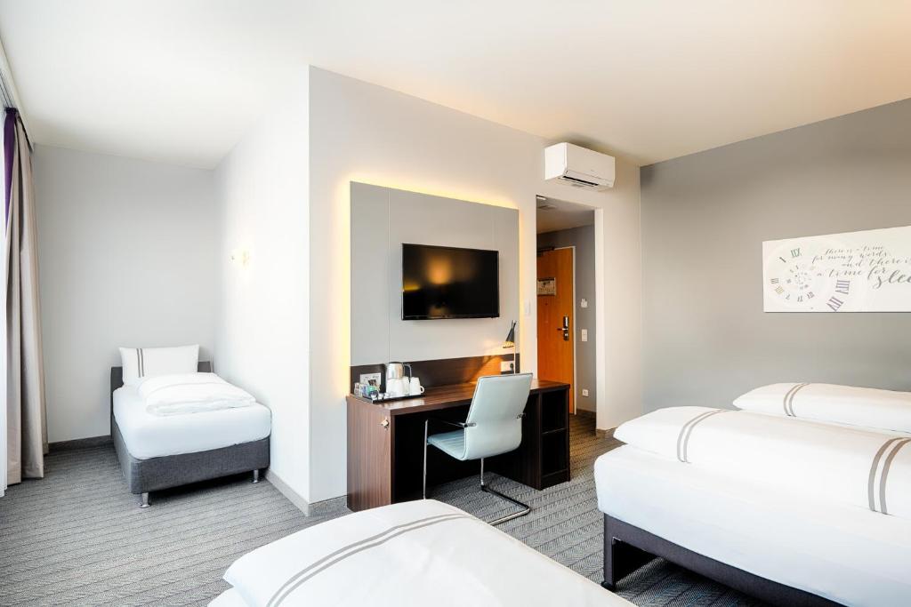 Letto o letti in una camera di Premier Inn München City Ost