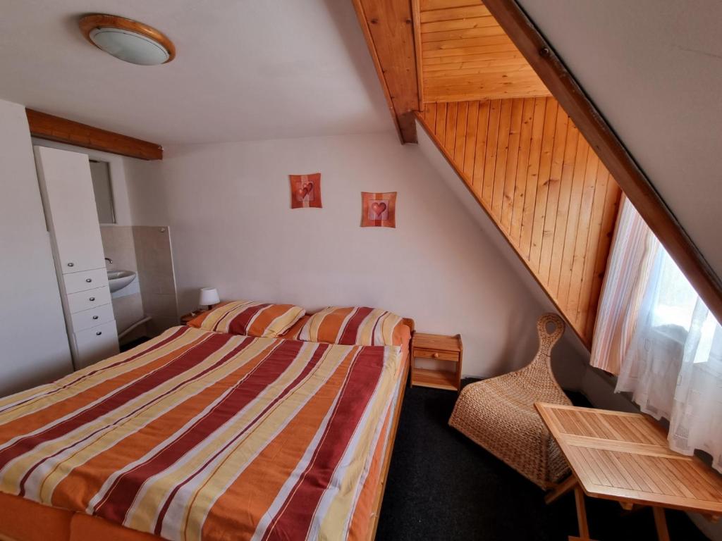 Postel nebo postele na pokoji v ubytování Penzion Tomy Pihlov