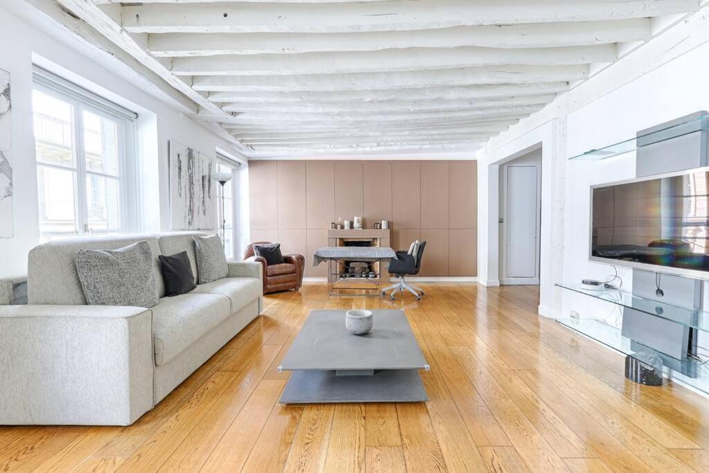 Photo de la galerie de l'établissement Marais Historical Center Charming Apartment 1BR, à Paris