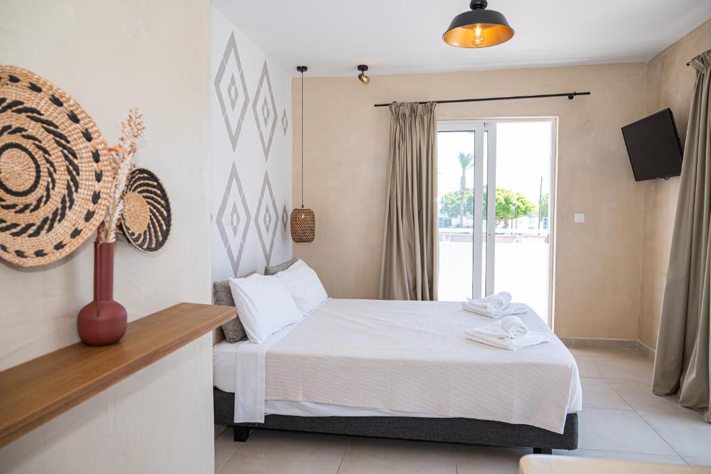 Atma Beach Rooms & Suites - 17