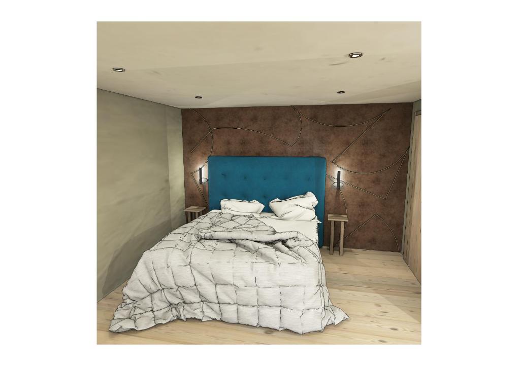 Säng eller sängar i ett rum på Chalet zur Auszeit