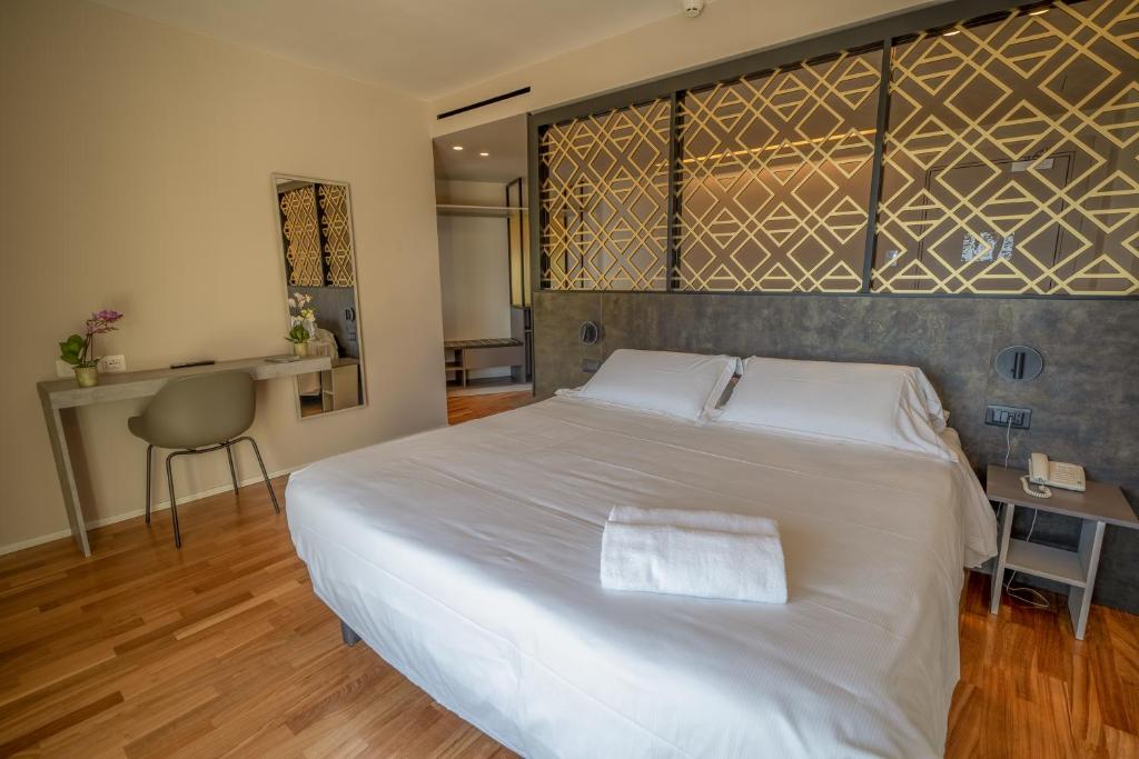 Ένα ή περισσότερα κρεβάτια σε δωμάτιο στο Plaza Hotel Catania