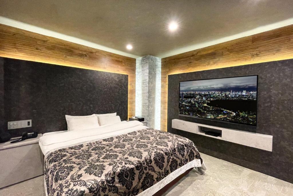 Postel nebo postele na pokoji v ubytování Hotel ZALA