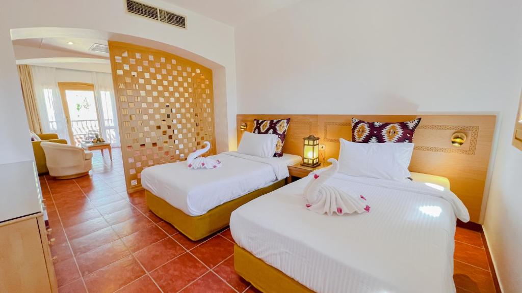 Postel nebo postele na pokoji v ubytování Tamra Beach Resort