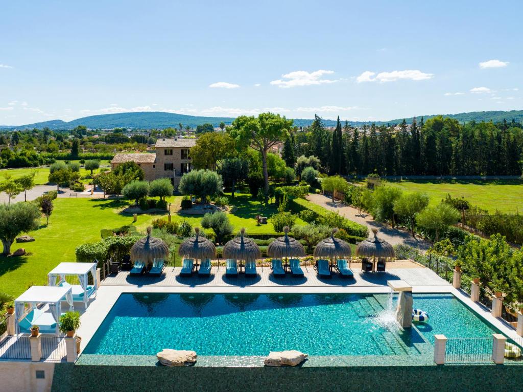 an aerial view of a villa with a swimming pool at Cas Metge Matas in Santa Maria del Camí