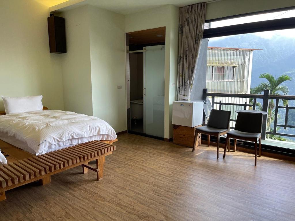 Postel nebo postele na pokoji v ubytování House of Ahan