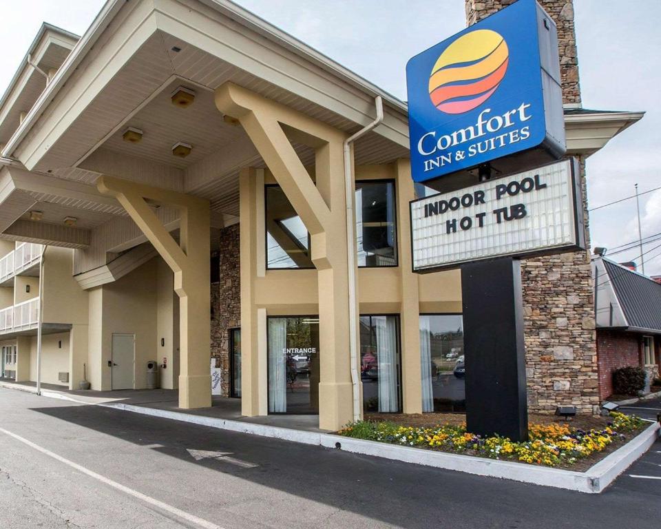 a front of a store with a sign for a restaurant at Comfort Inn & Suites at Dollywood Lane in Pigeon Forge