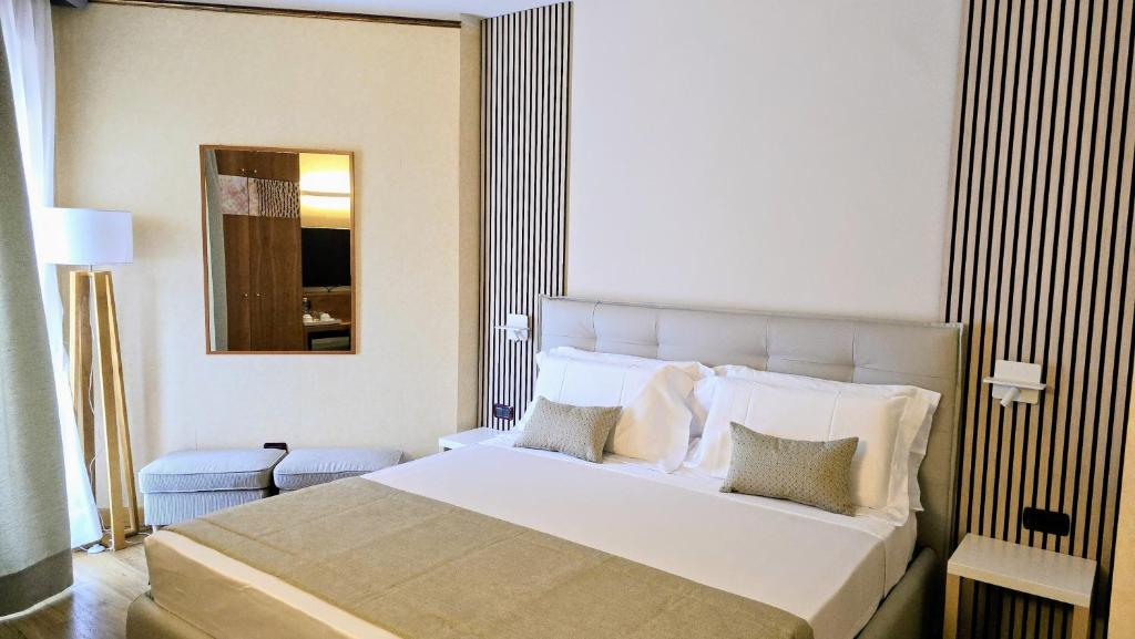 Postel nebo postele na pokoji v ubytování Parc Hotel