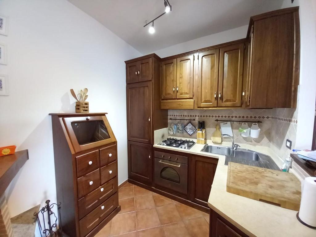 Kuchyň nebo kuchyňský kout v ubytování VANIA BLU Alloggio Turistico