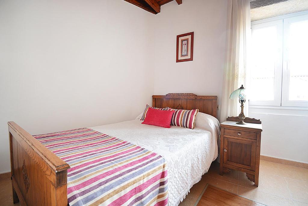 Posteľ alebo postele v izbe v ubytovaní Casa en Muros con preciosas vistas al mar