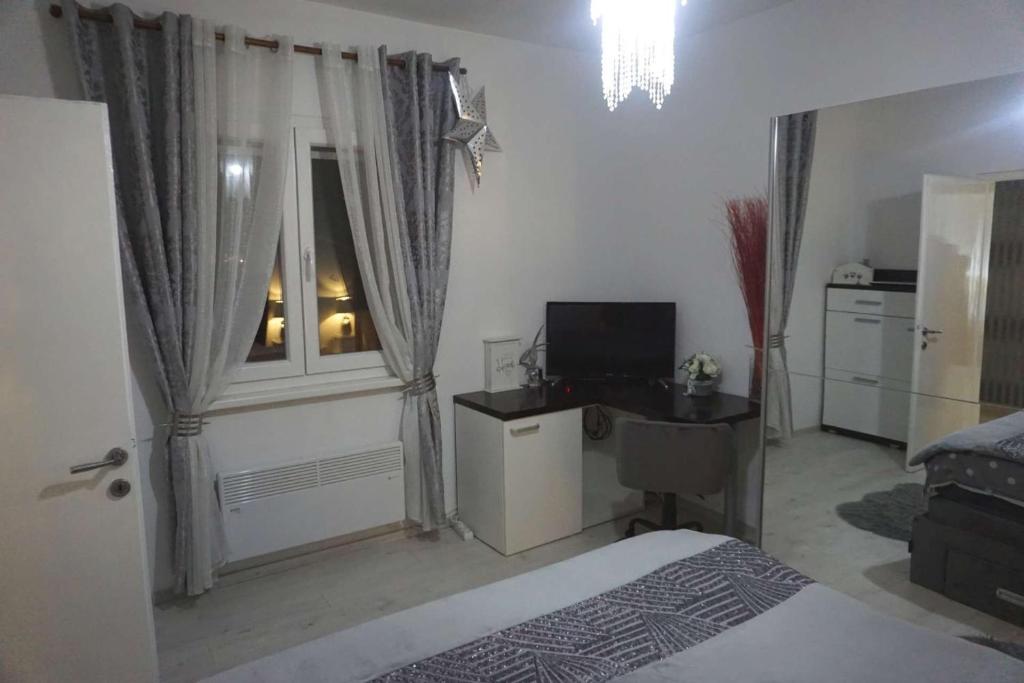 Televízia a/alebo spoločenská miestnosť v ubytovaní Seaview Holiday Home GATSBY