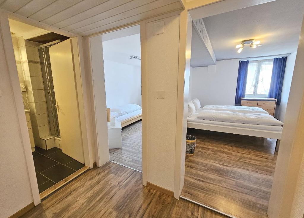 Postel nebo postele na pokoji v ubytování Hotel Taverne zur Linde
