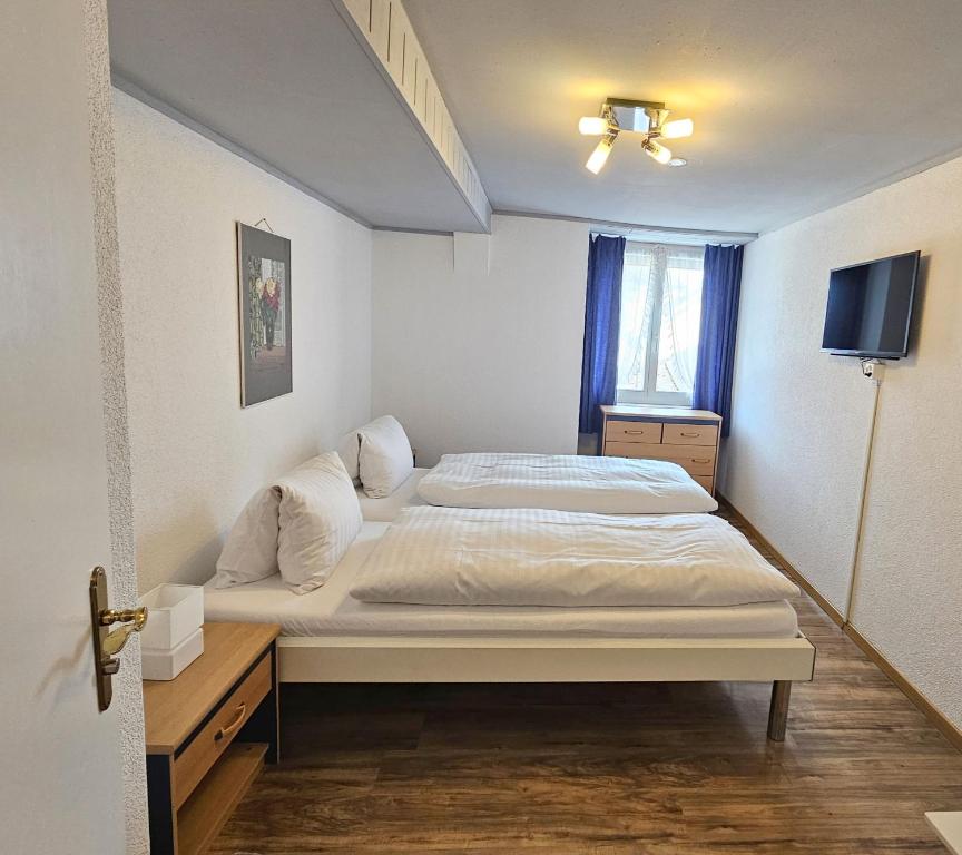 Postel nebo postele na pokoji v ubytování Hotel Taverne zur Linde