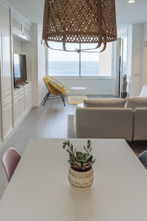 Televízia a/alebo spoločenská miestnosť v ubytovaní Tabaiba SeaView